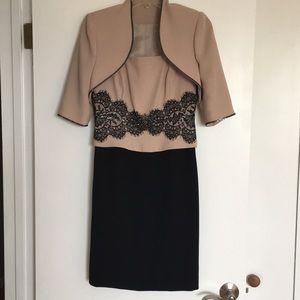 An elegant two-piece suit dress by Junnie Leigh